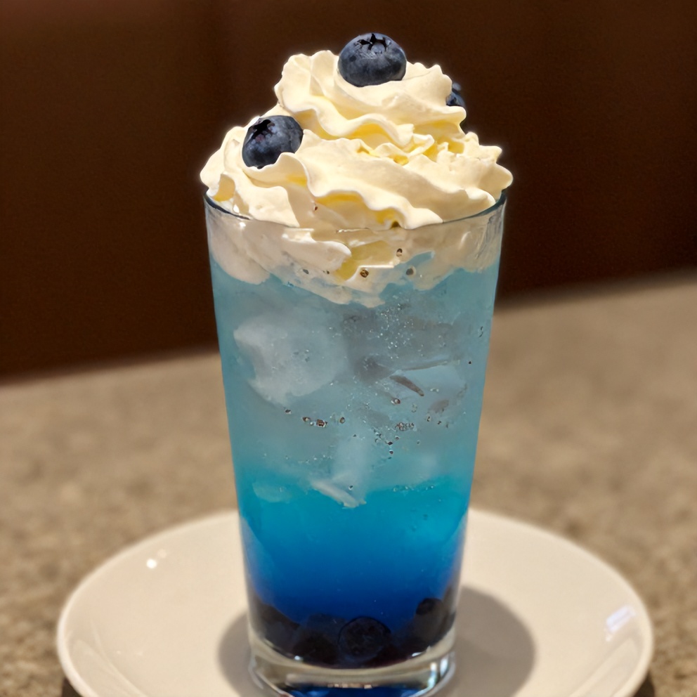 A close-up of a glass of Italian cream soda with sugar-free blueberry syrup